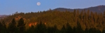 The setting moon over Califorina’s Trinity Alps